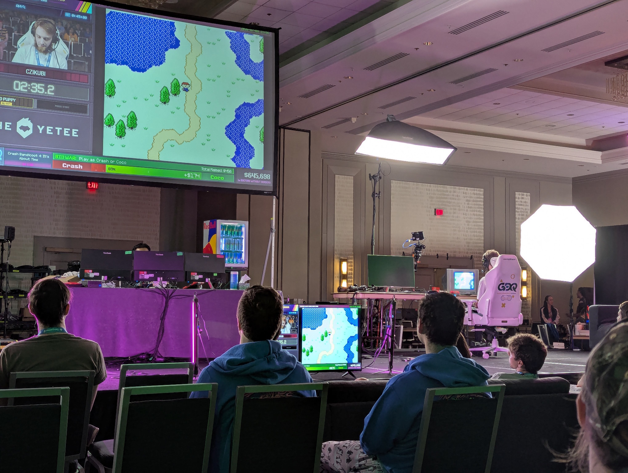 Photograph of the main stage that is much closer than before. This time, _Mother_ for the NES (known officially in the US as _Earthbound Beginnings_) is on screen.